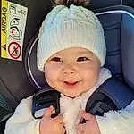 Joue, Sourire, Blanc, Comfort, Textile, Baby & Toddler Clothing, Baby, Car Seat, Bambin, Baby Carriage, Cap, Happy, Enfant, Auto Part, Baby Products, Baby In Car Seat, Fun, Steering Wheel, Luxury Vehicle, Personne, Joy, Headwear