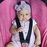 Joue, Head, Yeux, Doll, Purple, Baby & Toddler Clothing, Human Body, Sleeve, Comfort, Rose, Finger, Baby, Violet, Lap, Baby Carriage, Bambin, Thumb, Magenta, Baby Products, Personne, Headwear