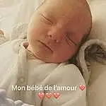 Nez, Joue, Peau, Head, Lip, Eyebrow, Comfort, Baby Sleeping, Textile, Baby & Toddler Clothing, Baby, Finger, Happy, Headgear, Bambin, Linens, Thumb, Close-up, Bedtime, Enfant, Personne